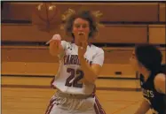  ?? PHOTO COURTESY OF TRETT BISHOP ?? Clear Lake’s Rylee Mix whips the ball across the floor during a 40-29 league win over the Willits Wolverines during North Central League I play nearly a year ago today in Lakeport.