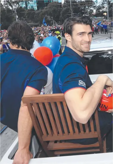  ??  ?? Bulldogs acting captain Easton Wood with injured skipper Bob Murphy in the parade yesterday.
