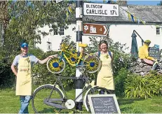  ??  ?? A warm welcome at Greystoke Cycle Café, left; enjoy empty roads and sweeping views as you pedal through the glorious Lake District, right