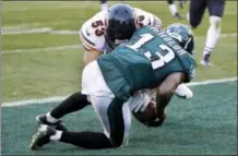  ?? MICHAEL PEREZ — THE ASSOCIATED PRESS ?? Philadelph­ia Eagles wide receiver Nelson Agholor (13) recovers a fumble for a touchdown against the Chicago Bears last week.