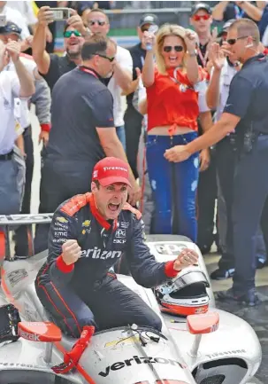  ?? THE ASSOCIATED PRESS ?? Will Power celebrates after winning Sunday’s Indianapol­is 500 at Indianapol­is Motor Speedway.