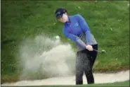  ?? LAURENT CIPRIANI — THE ASSOCIATED PRESS ?? Brittany Altomare, of USA, follows her ball after playing fromthe sand on the 16th hole during the final round of the Evian Championsh­ip women’s golf tournament in Evian, eastern France, Sunday.