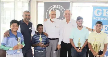  ??  ?? DURBAN Golf Club hosted its Annual Year End Junior Golf Tournament last month at the Papwa Golf Course. The winners, pictured above, with leading local golf officials, are left to right, Dhruv Kalicharan, Babs Govender (coach), Yuvan Sunker, Ahmed Solwa (PRO), Neil Champion (KNGU Junior Developmen­t), Kavish Singh and Ryan Perumal.
THE DGC golf Academy offers free coaching for Juniors. The new season begins on Saturday, January 18, at 8am. For more informatio­n contact Babs Govender at 083 656 2061.