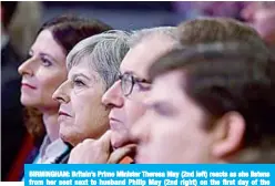  ??  ?? BIRMINGHAM: Britain’s Prime Minister Theresa May (2nd left) reacts as she listens from her seat next to husband Philip May (2nd right) on the first day of the Conservati­ve Party Conference 2018 yesterday. —AFP