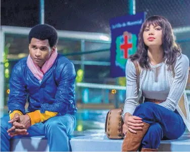  ?? COURTESY OF THE WEINSTEIN CO. ?? Usher Raymond, left, and Jurnee Smollett-Bell in a scene from “Hands of Stone.”