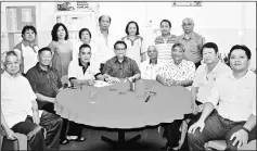  ??  ?? Nanta (seated fourth left) joins Thiam Ing, on his right, and the 20182020 committee members of SUPP Kapit in a photo-call after the meeting.