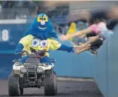  ?? L. TODD SPENCER/STAFF FILE ?? Rip Tide riding an ATV and greeting fans at Harbor Park is one of the many things that will be missed in 2020.