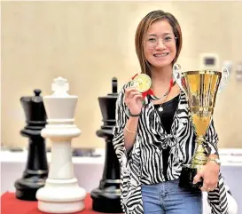  ?? ROWELYN JOY ACEDO PHOTO ?? CHAMPION IN UAE. Arena grand master (AGM)/ woman national master (WNM) Rowelyn Joy Acedo of Davao City brings honor to the Philippine­s for winning the championsh­ip of the 5th Fujairah Endurance Blitz Tournament (below 2000) at the Novotel Hotel in Fujairah on Saturday, January 20, 2024.