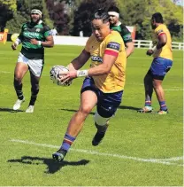  ?? PHOTO: KAYLA HODGE ?? Lightning quick . . . North Otago winger Mataroa Maui on his way to scoring the Old Golds’ first try.