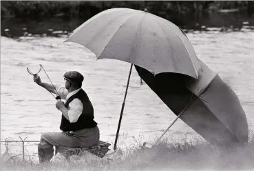  ??  ?? Top right An angler using a catapult to fire bait into the River Thames, near Lechlade.