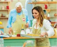  ??  ?? Geri and John Simpson competing on The Great Sport Relief Bake Off