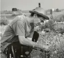  ??  ?? It began with 30 roses that withered ... Derek Jarman at Prospect Cottage. Photograph: Howard Sooley