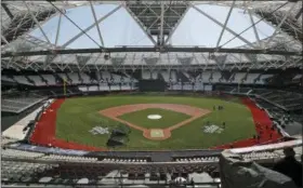  ?? FRANK AUGSTEIN — THE ASSOCIATED PRESS ?? General view at the pitch during an unveiling of the London Stadium in London Thursday. Major League Baseball (MLB) is hoping to make its mark its European debut with the New York Yankees versus Boston Red Sox game at London Stadium this weekend.