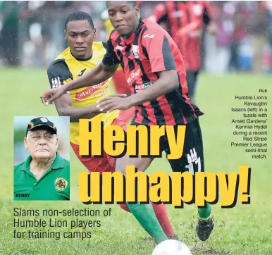  ?? FILE ?? HENRY Humble Lion’s Kevaughn Isaacs (left) in a tussle with Arnett Gardens’ Kenniel Hydel during a recent Red Stripe Premier League semi-final match.