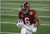  ?? ROGER STEINMAN — THE ASSOCIATED PRESS ?? Alabama wide receiver DeVonta Smith (6) gains yardage after a catch in the first half of the Rose Bowl against Notre Dame on Friday in Arlington, Texas.