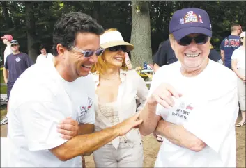  ?? Hearst Connecticu­t Media file photos ?? Bill Evans, Joy Philbin and Regis Philbin laugh together during charity softball game in Greenwich in 2008.