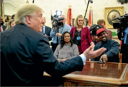  ?? AP ?? US President Donald Trump meets with rapper Kanye West in the Oval Office this week. West’s rambling monologue praising the president reflected the masculine appeal of Trump’s election campaign and leadership style.