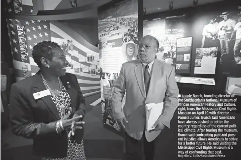  ?? Rogelio V. Solis/Associated Press ?? ■ Lonnie Bunch, founding director of the Smithsonia­n’s National Museum of African American History and Culture, right, tours the Mississipp­i Civil Rights Museum on April 19 with director Pamela Junior. Bunch said Americans have always pushed to better...