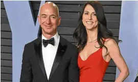  ?? —AP ?? FREE AGAIN The world’s richest man Jeff Bezos and now exwife MacKenzie during a Hollywood party last year.