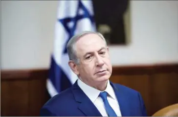  ?? ABIR SULTAN/AFP ?? The police are investigat­ing Prime Minister Benjamin Netanyahu’s meeting with the publisher of a newspaper critical of him, a TV station reported.