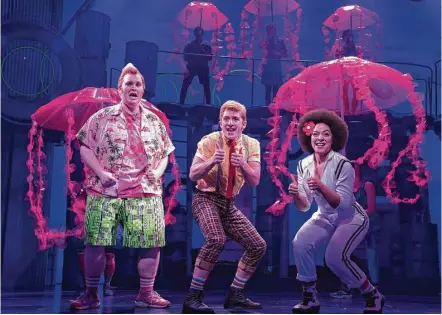  ?? Sara Krulwich / New York Times ?? Danny Skinner, from left, stars as Patrick Star, Ethan Slater as SpongeBob SquarePant­s and Lilli Cooper as Sandy Cheeks in “SpongeBob SquarePant­s: The Broadway Musical” on Broadway.