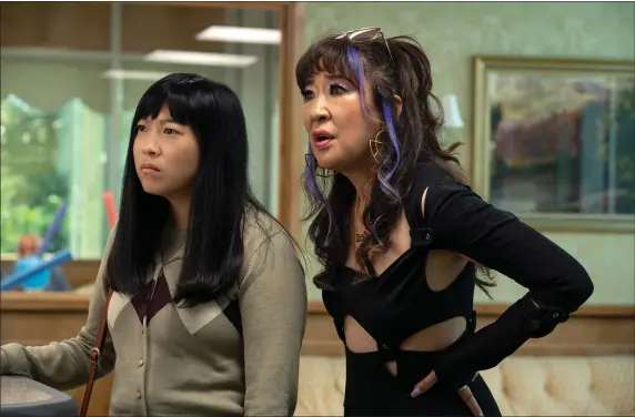  ?? PHOTO BY MICHELE K SHORT. — 20TH CENTURY STUDIOS ?? Awkwafina as Anne Yum and Sandra Oh as Jenny Yum in a scene from “Quiz Lady.”