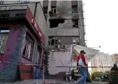  ?? AFP ?? A damaged building in Kyiv, after Russia launched an estimated 40 drones at the city yesterday