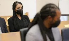  ?? Associated Press ?? Ashley Sherman, left, looks on during a court hearing for her husband, Richard Sherman, right.