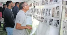  ?? ?? ABOVE: Attendees were excited to see some of the pioneering people and sporting legends in a picture display in the tent museum.