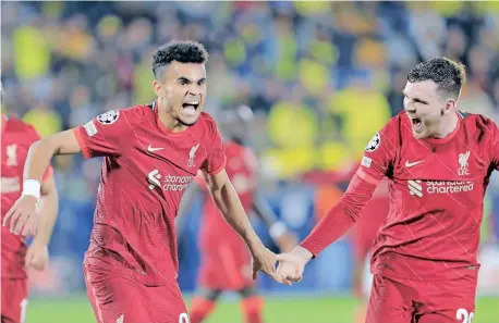  ?? | DOMENECH CASTELLO EPA ?? LUIS Diaz, left, celebrates with teammate Andy Robertson after scoring for Liverpool against Villarreal.