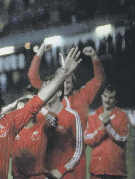  ?? ?? Willie Miller celebrates with the rest of the Aberdeen players after winning the Cup Winners Cup in 1983, the last time a Scottish club won a European trophy