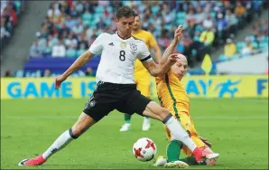  ?? REUTERS ?? Germany’s Leon Goretzka fends off Australia’s Aaron Mooy during their Confederat­ions Cup clash on June 19. Goretzka’s stock is rising fast after impressive performanc­es in Russia.