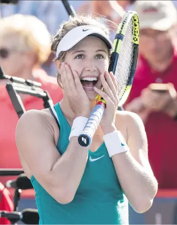  ?? PAUL CHIASSON/THE CANADIAN PRESS ?? Canada’s Eugenie Bouchard reacts after beating Lucie Safarova of the Czech Republic during women’s first-round Rogers Cup tennis action in Montreal on Tuesday.