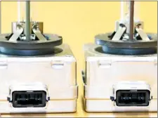  ??  ?? Pictured are D1 and D3 HID burners with an integral igniter. Note the different moulding used for the plastic connector, because D3 burners (on the left) contain no mercury and have a different electrical ballast specificat­ion.