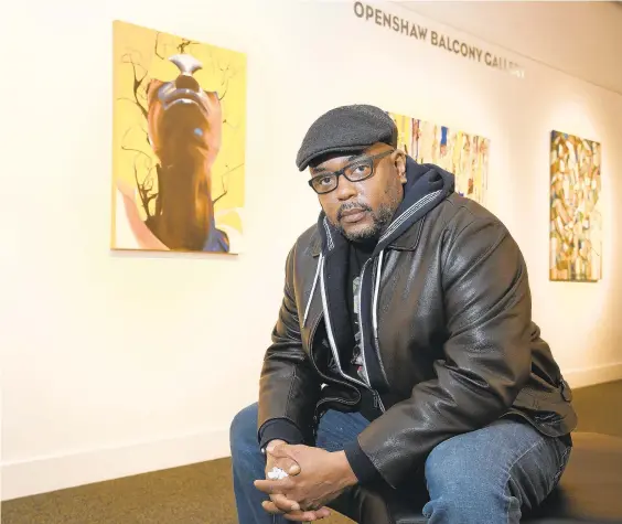  ?? PAUL W. GILLESPIE/BALTIMORE SUN MEDIA ?? Artist Qrcky is one of eight Black artists based in Maryland, commission­ed for the exhibit. “Art of Activism,” and his art below, is on display until Feb. 27.