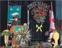  ?? CP PHOTO ?? Nancy Southern pays tribute to her father, business magnate and Spruce Meadows co-founder Ron Southern at a celebratio­n of his life at Spruce Meadows in Calgary, Alta., Thursday.