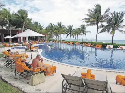  ?? JOHN NOWLAN PHOTO ?? Poolside Relaxing at Zoetry. No loud music.