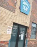  ??  ?? Sweet Leaf Marijuana Center, at 2609 Walnut St. in Denver, displays a notice of suspension from the City of Denver Department of Excise and Licenses.