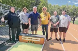  ?? Brian Gioiele/Hearst Connecticu­t Media ?? From left, Elijah Descheen, James Zaccagnini, tech ed teachers Jeff Roy and Jeff Mackniak, Mike Owens and Alex Guerra with part of the miniature golf course the Career and Tech Education students created for Get Outside and Play Day.