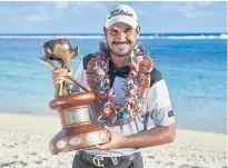  ?? ASIAN TOUR ?? Gaganjeet Bhullar holds the Fiji Internatio­nal trophy.