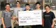  ??  ?? Devon Prep Middle School Christian Action Program (CAP) members helped raise nearly $7,000 for St. Jude Children’s Research Hospital, they are, from left: Sixth Grader Peter DeMaio of Havertown, Eighth Graders Joseph Scavitto of Chester Springs, Ryan...