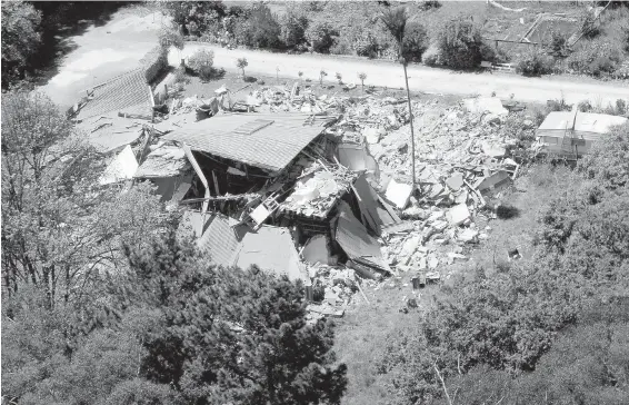  ?? MIKE SCOTT, NEW ZEALAND HERALD VIA AP ?? The homestead destroyed by Monday's 7.8-magnitude quake, which killed resident Louis Edgar, near Kaikoura, New Zealand.