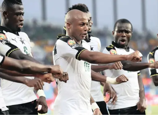  ??  ?? THIS IS HOW WE DO IT: Andre and Jordan Ayew took following in their father’s footsteps to another level with their goals against the DRC on Saturday. EPA