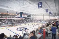  ?? Associated Press ?? This artist’s rendering provided by UConn shows the proposed UConn Hockey Arena approved by the school’s board of trustees.