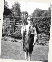  ?? ?? Jenny in her St Hilary’s uniform, in the garden at Yardley Park Road