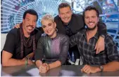  ?? — AP ?? ( Left) Lionel Richie, Katy Perry, Ryan Seacrest and Luke Bryan in New York as judges for the next season of American Idol, premiering on ABC on Sunday.