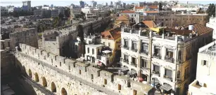  ?? (Ronen Zvulun/Reuters) ?? A GENERAL VIEW shows Jaffa Gate of Jerusalem’s Old City. An in-depth renovation plan seeks to visually unify the gates of the Old City.