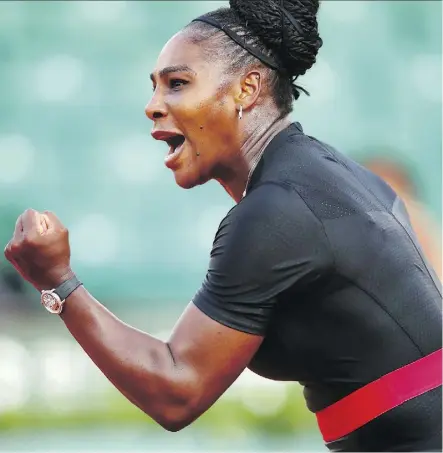  ?? CLIVE BRUNSKILL/GETTY IMAGES ?? Serena Williams celebrates a point during her second-round match against Ashleigh Barty Thursday at the French Open at Roland Garros in Paris. Williams beat the 17th seed 3-6, 6-3, 6-4.