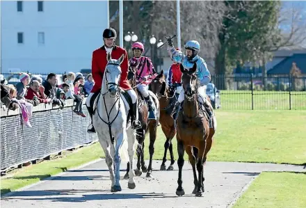  ??  ?? Cameron Lammas salutes the judge after Hello M’Lady completed a Rotorua double for rookie trainer Vicki Prendergas­t.