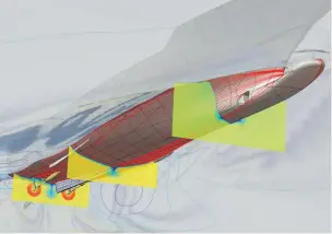  ??  ?? ABOVE: A CFD model depicting a motoryacht equipped with Hull Vane during resistance tests. TOP: A high-speed motoryacht undergoing calmwater resistance testing at the Wolfson Unit at the University of Southampto­n (England).